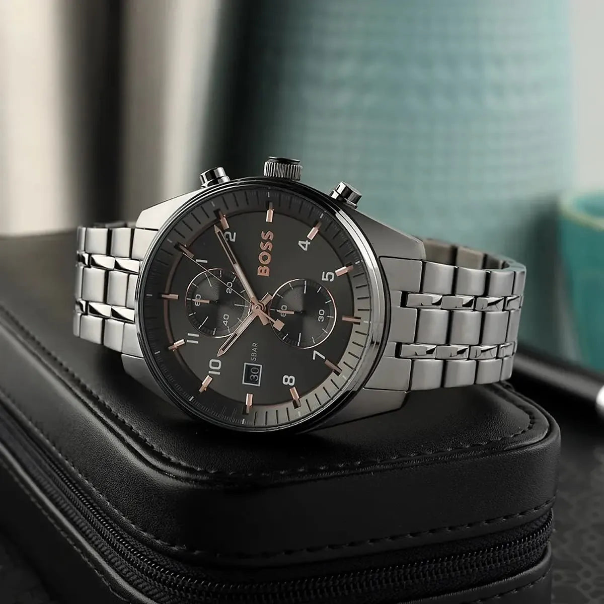 Hugo Boss Skytraveller chronograph watch styled on black surface