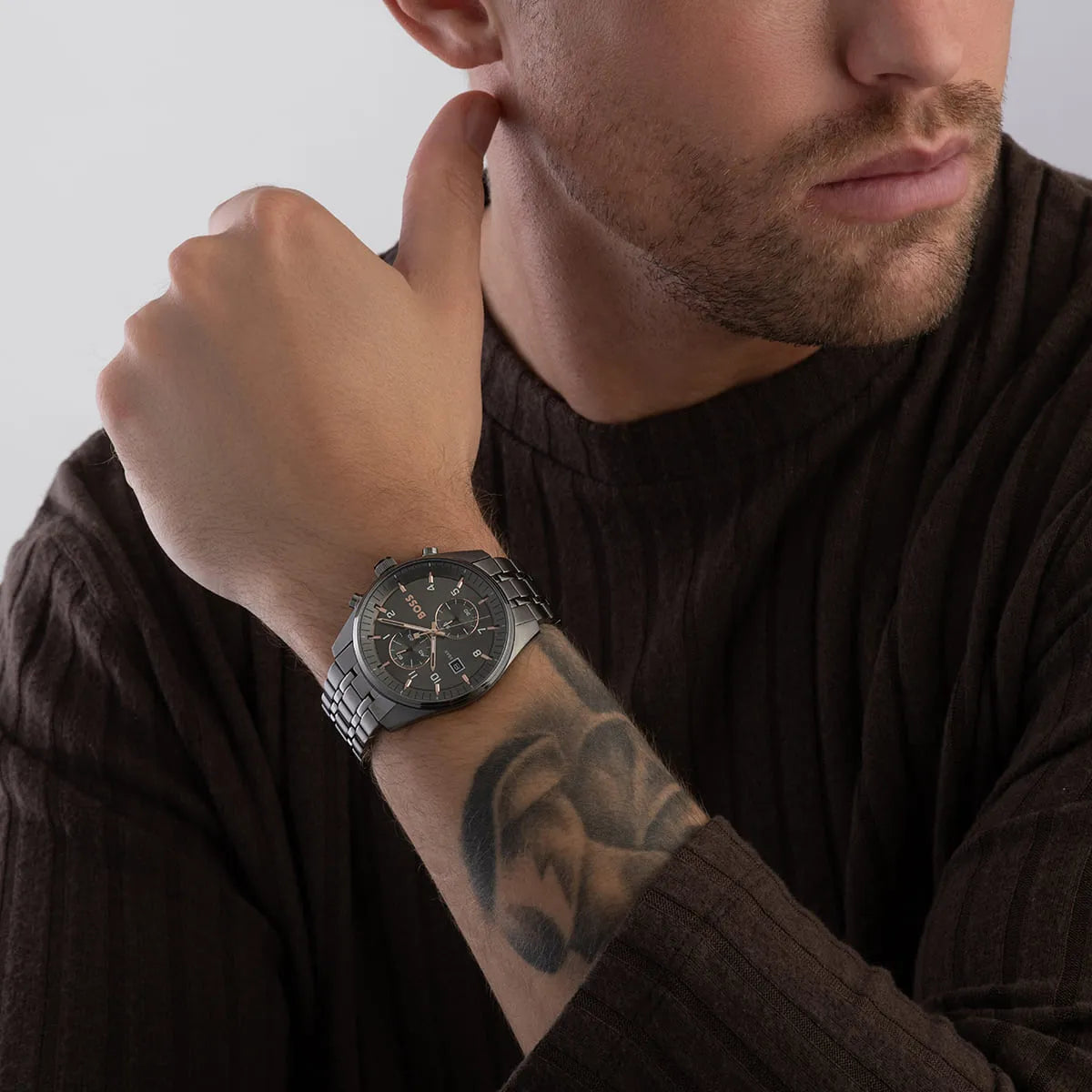 Hugo Boss Skytraveller chronograph watch worn on wrist on man