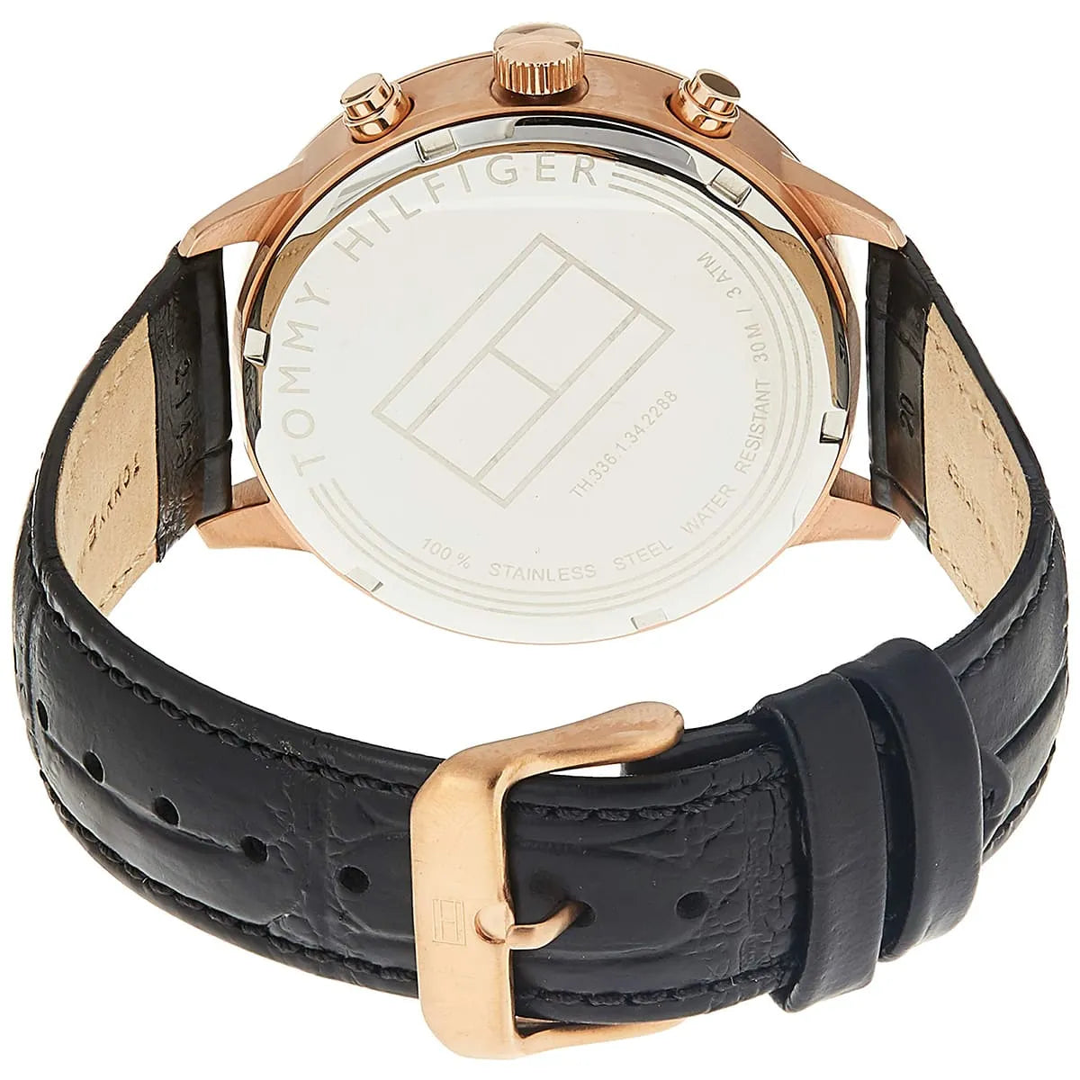 Tommy Hilfiger watch caseback with rose gold case and black leather strap detail