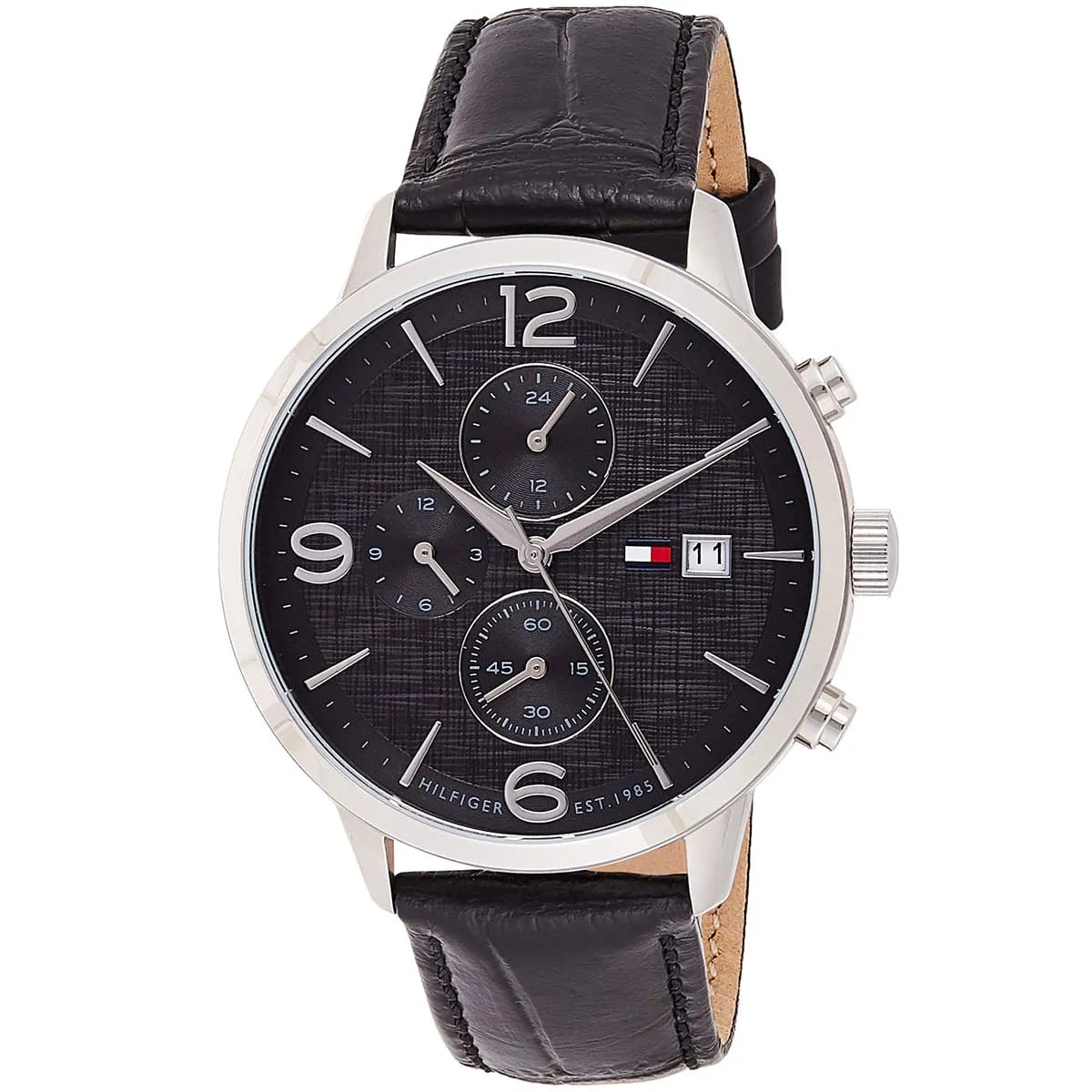 Tommy Hilfiger Liam watch at angle showing black dial, chronograph subdials, and leather strap