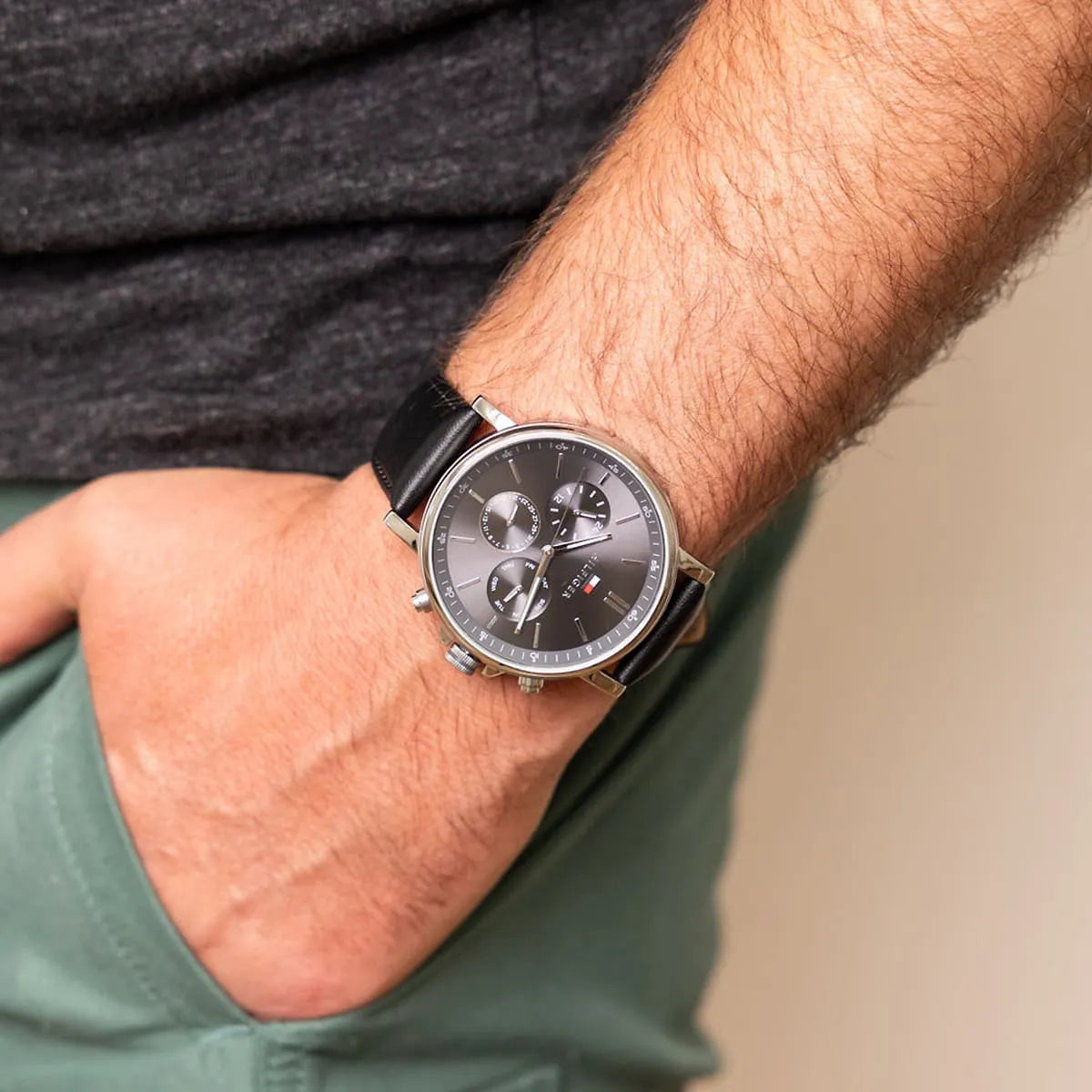 Tommy Hilfiger chronograph watch worn on wrist with black leather strap