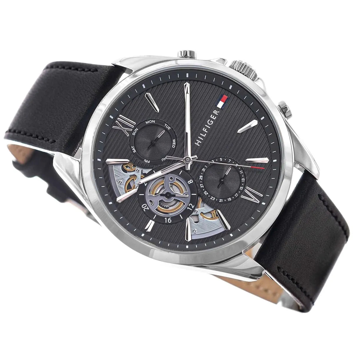 Angled view of Damon chronograph displaying dial details, visible tourbillon, and black leather band