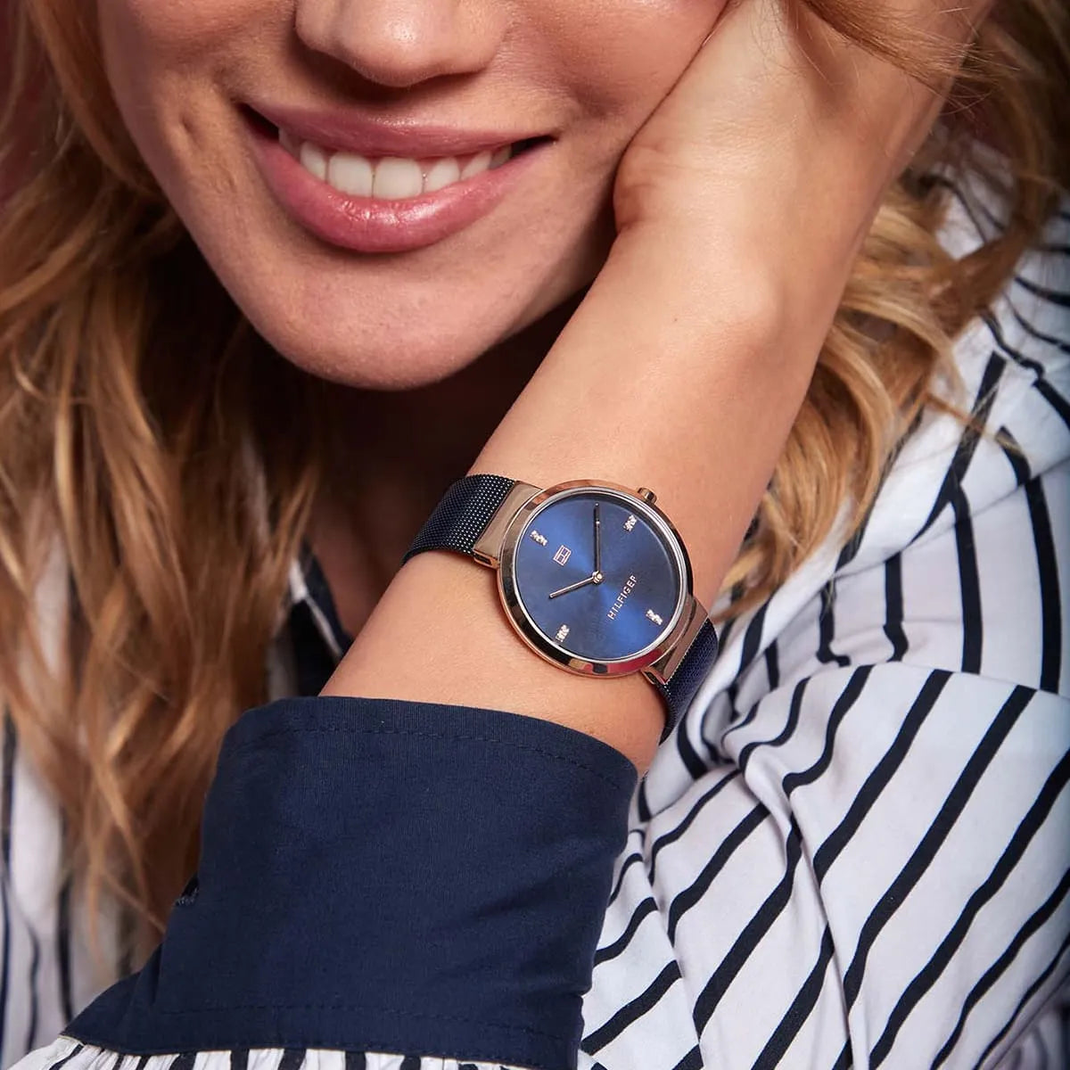 Tommy Hilfiger Liberty women's watch worn with striped shirt on wrist