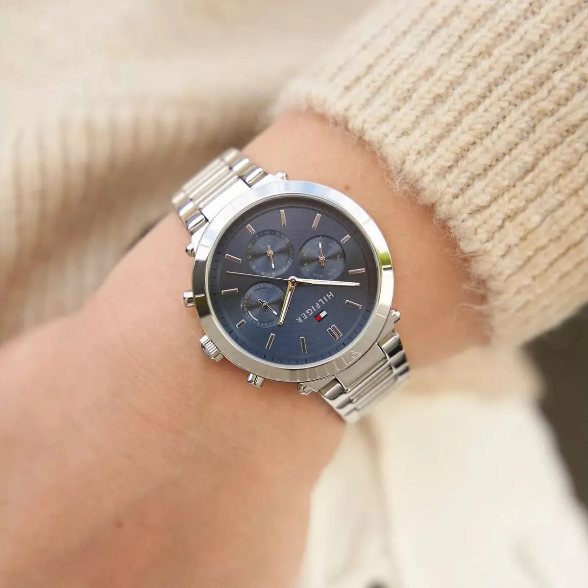 Wrist shot of Tommy Hilfiger women's chronograph with blue dial and stainless steel bracelet