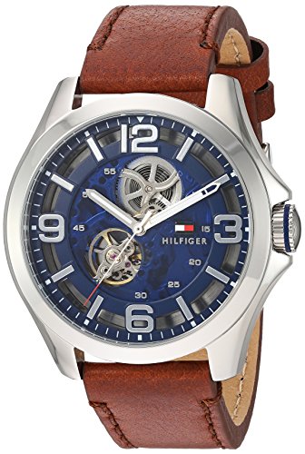 Angled view of Tommy Hilfiger Bruce watch showing blue dial with automatic dial details and brown leather strap