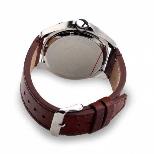 Tommy Hilfiger Bruce watch caseback showing brown leather strap attachment and crown