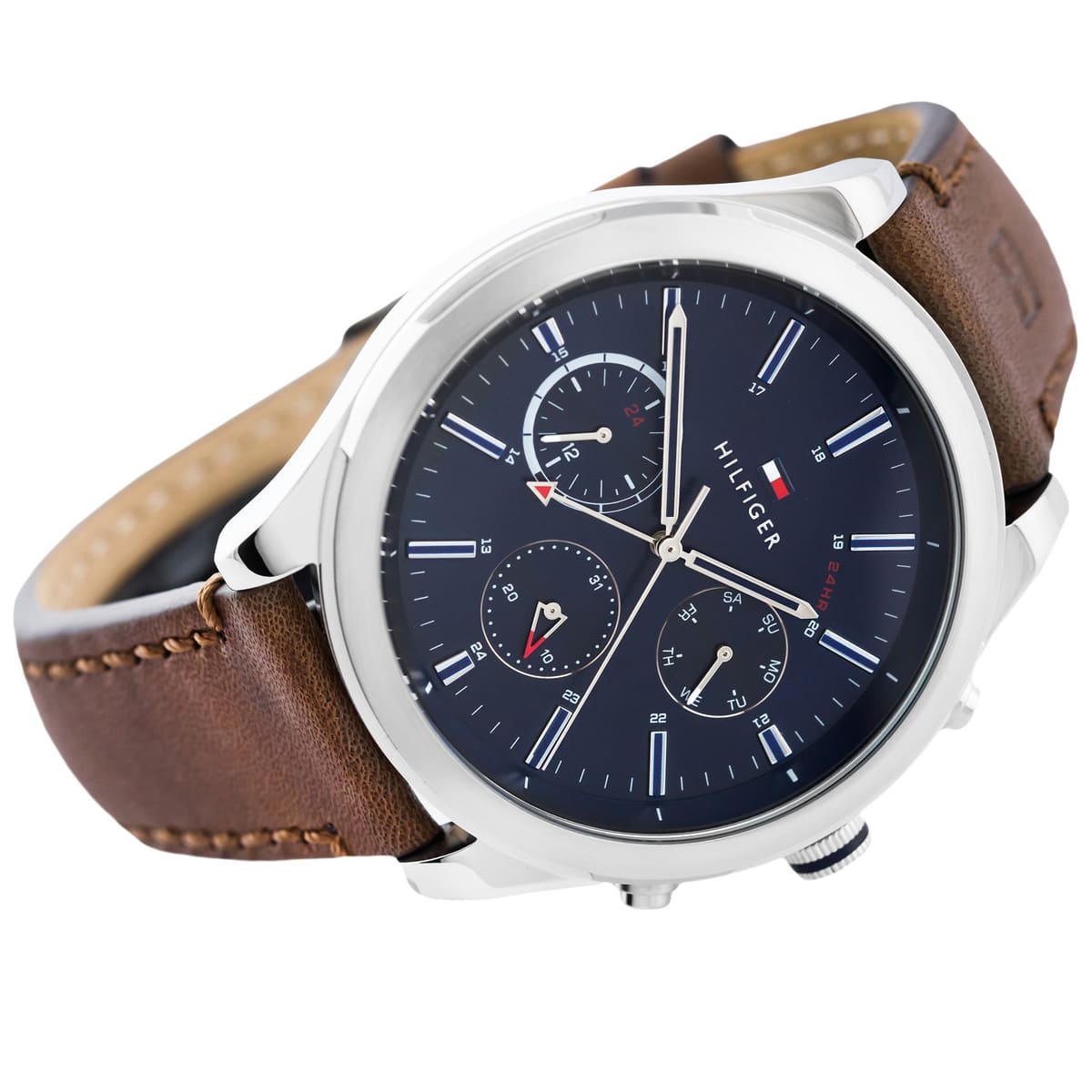 Three-quarter view of Tommy Hilfiger Ashton chronograph with navy dial and brown strap