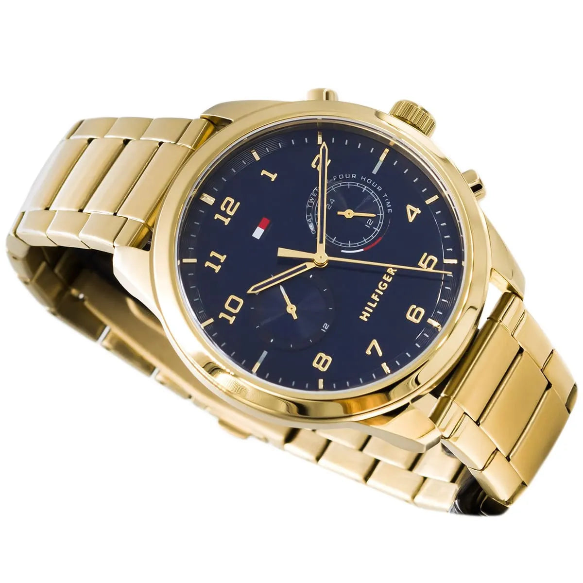 Gold Tommy Hilfiger multi-function watch on wrist at angle showing dial and bracelet