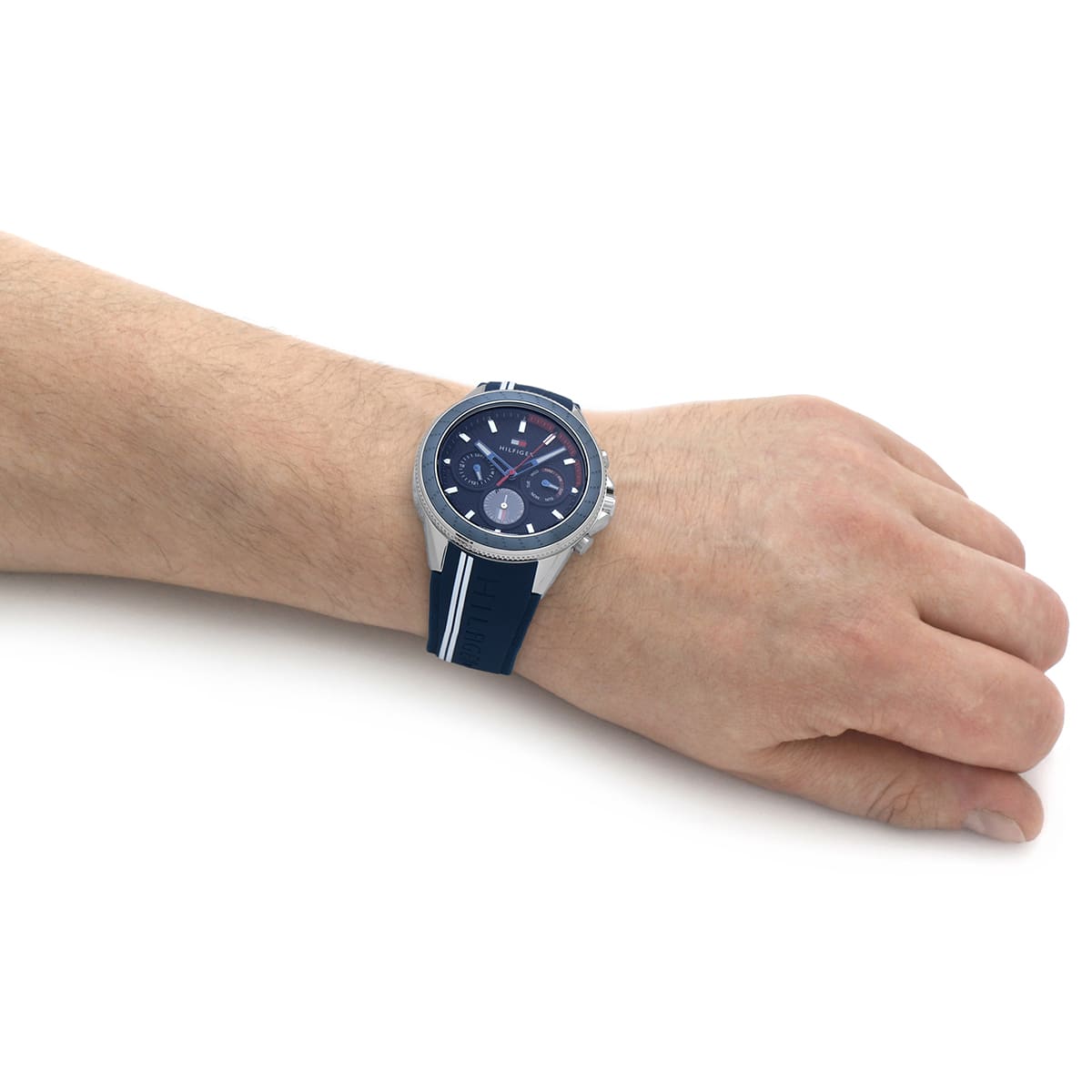 Tommy Hilfiger 45mm blue chronograph watch on male wrist demonstrating fit and size
