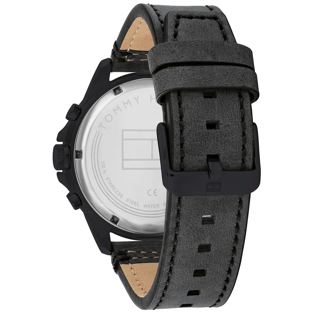 Tommy Hilfiger watch caseback showing white dial and multi-compartment design