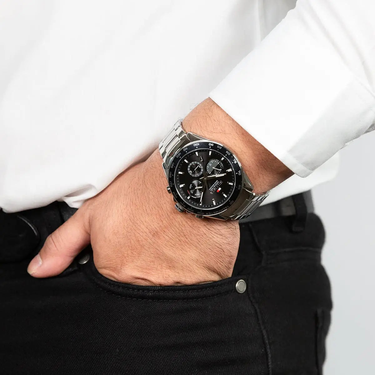 Tommy Hilfiger Damon watch on wrist with white shirt cuff