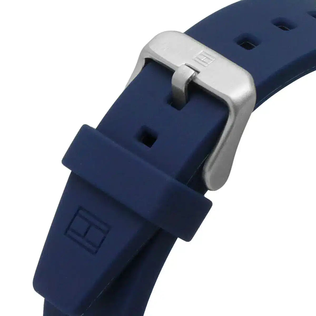 Close-up of Tommy Hilfiger blue rubber strap with buckle and adjustment holes