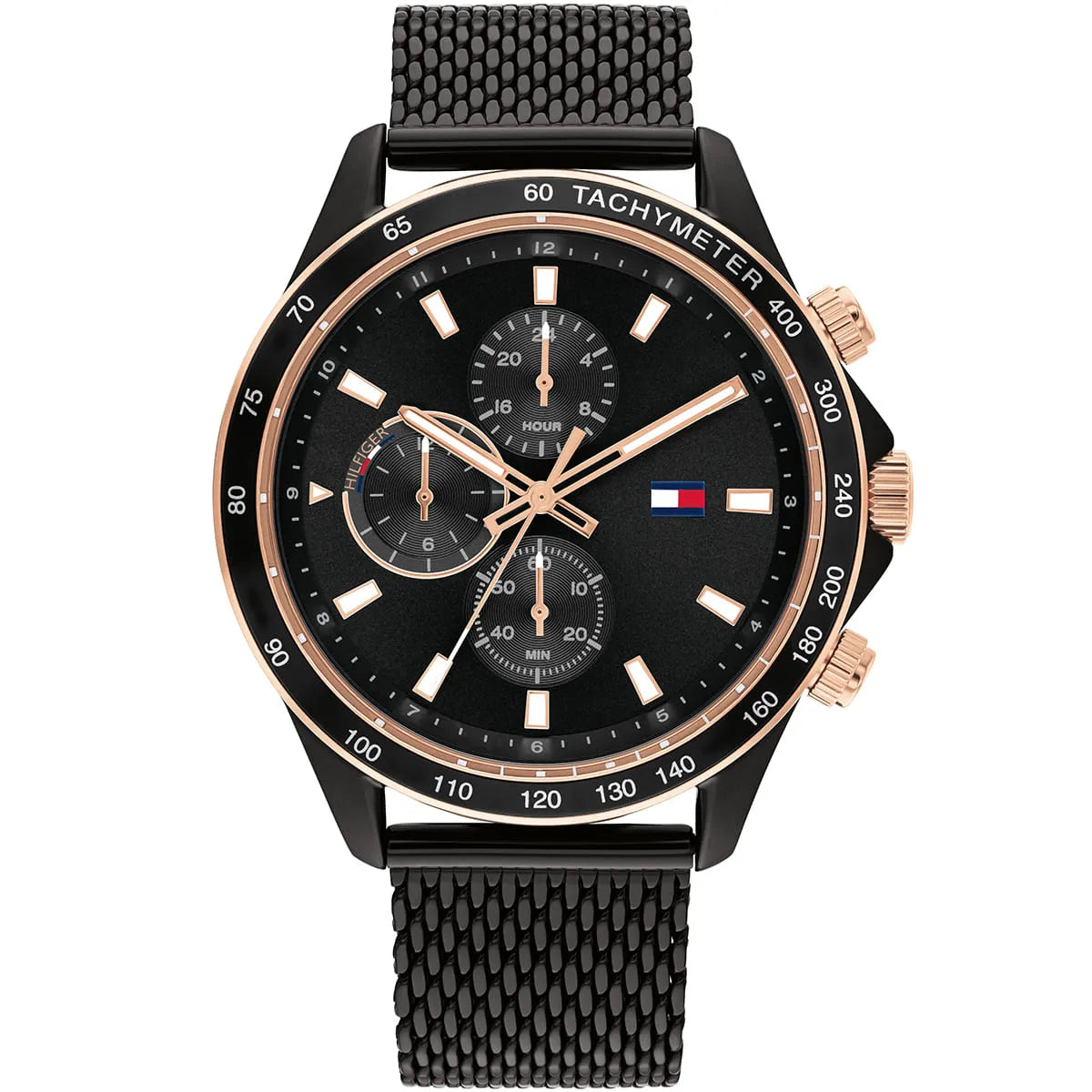 Tommy Hilfiger black dial chronograph watch with rose gold accents, tachymeter bezel, and black mesh strap
