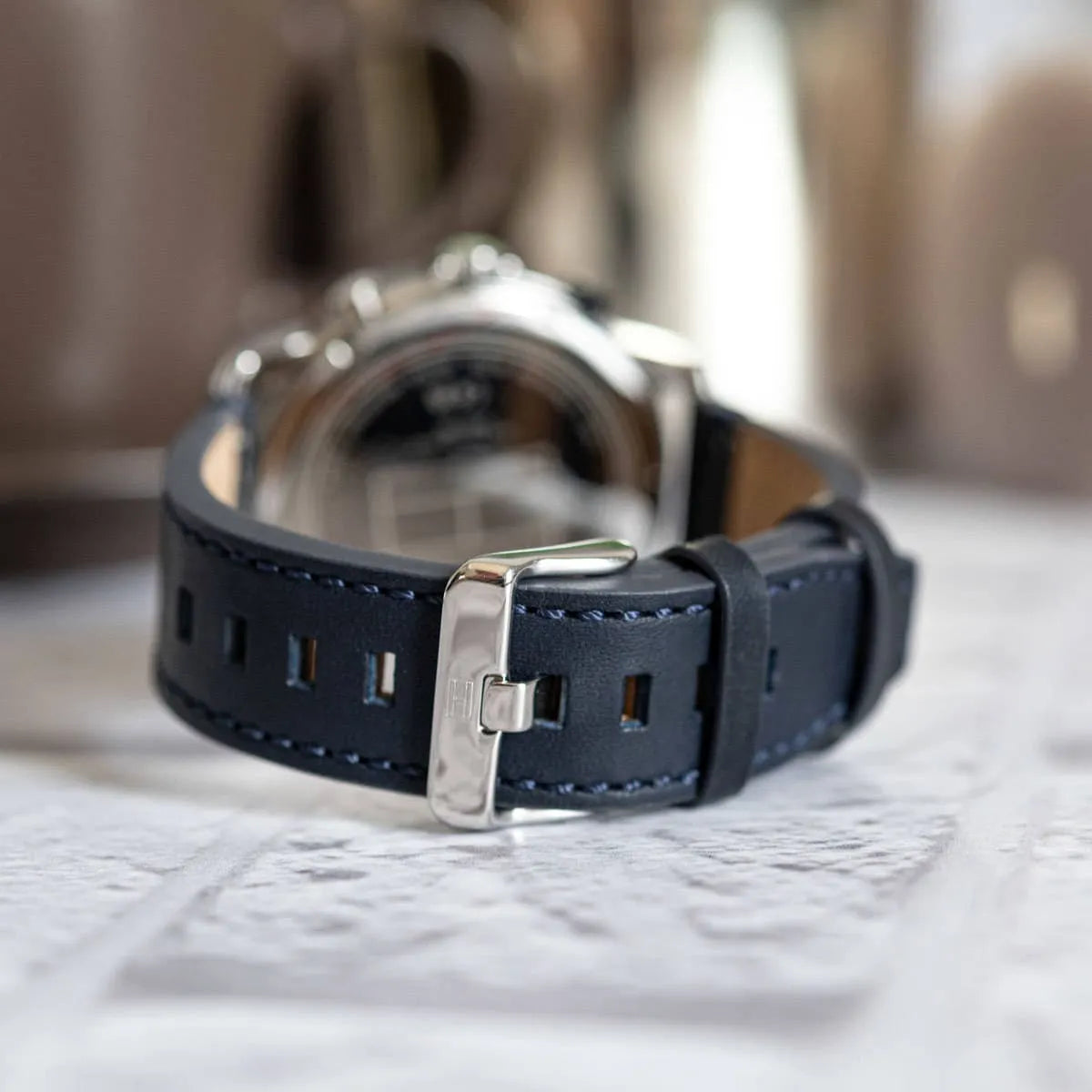 Close-up of Tommy Hilfiger chronograph blue dial with subdials and white hands