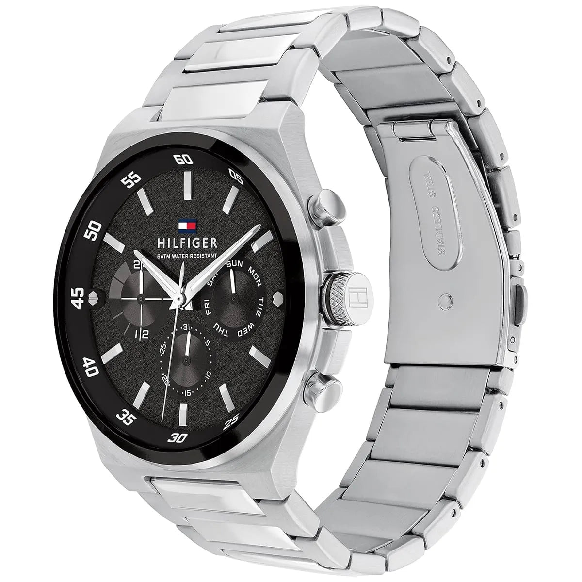 Tommy Hilfiger Dexter watch shown at angle with black dial and metal bracelet