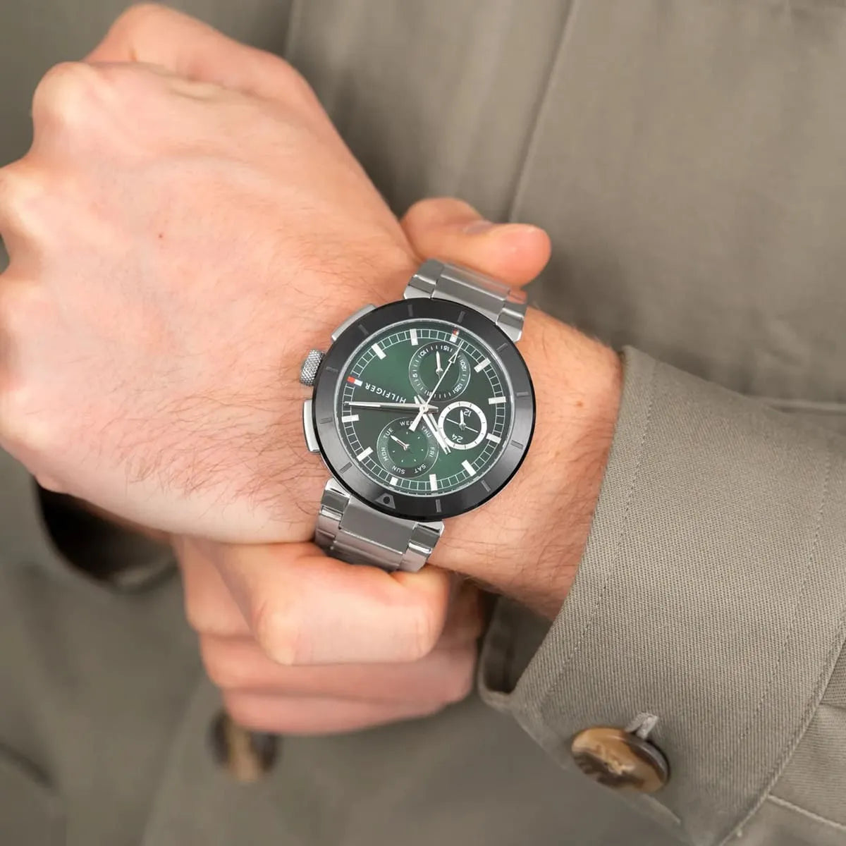 Tommy Hilfiger Lorenzo chronograph watch worn on wrist with gray sleeve
