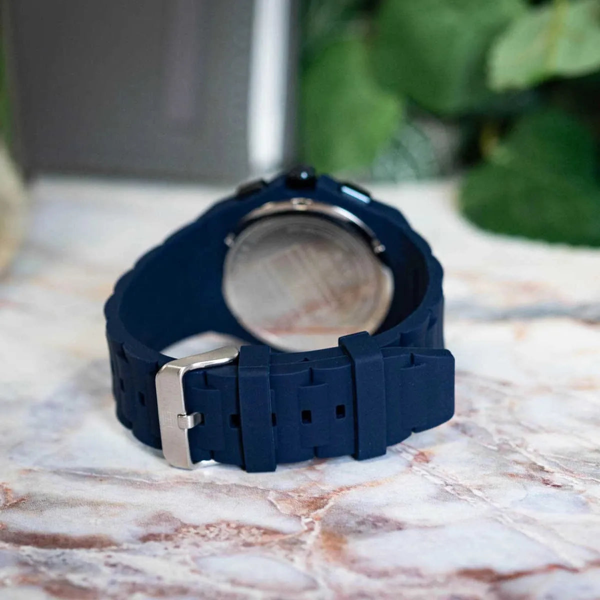 Tommy Hilfiger Neo watch caseback view showing rubber strap and silver buckle