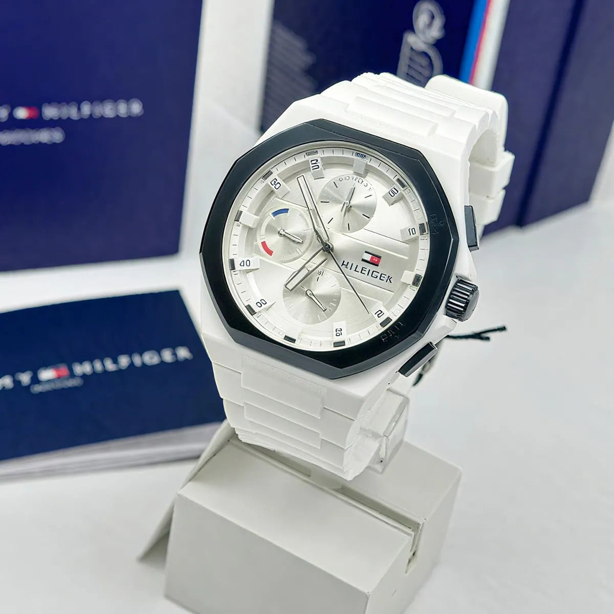 Tommy Hilfiger Neo men's watch on display stand with box in background