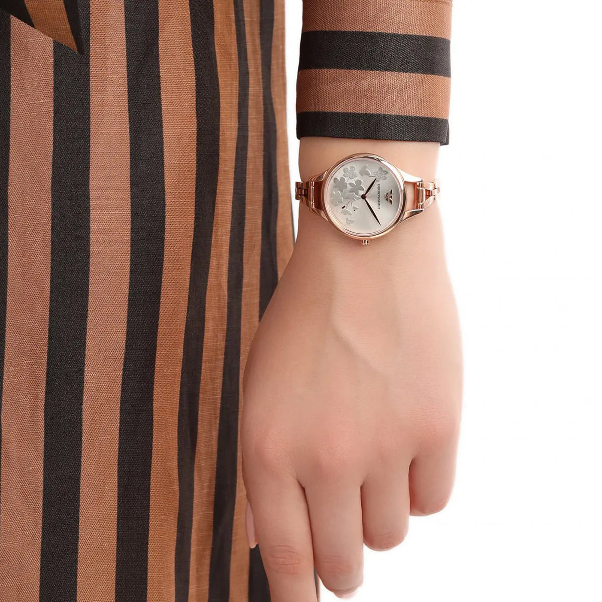 Emporio Armani Aurora watch on wrist styled with striped and banded accessories