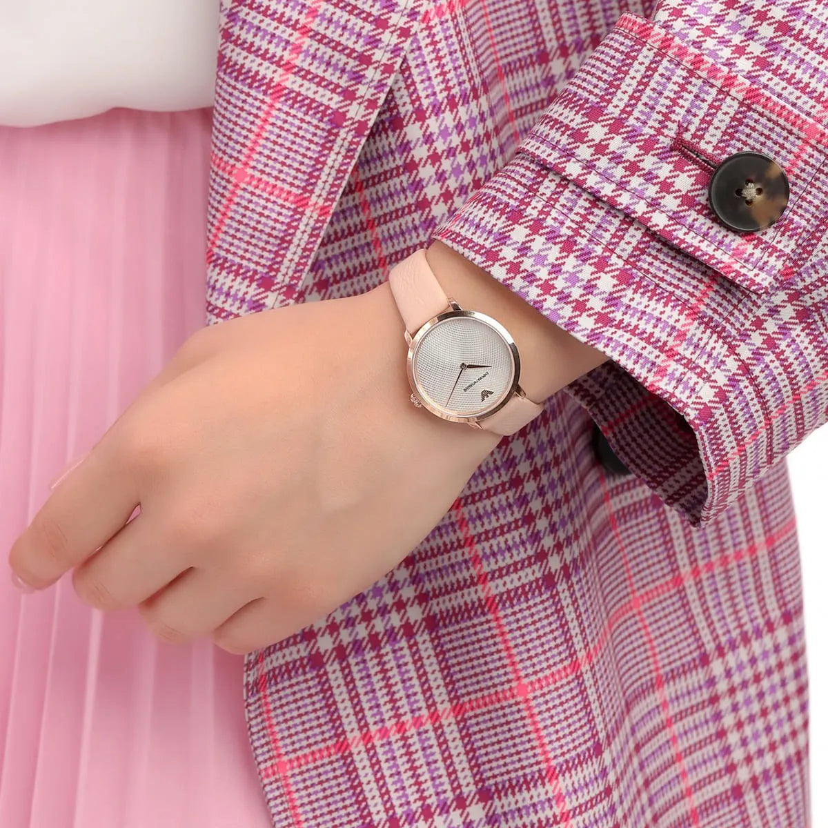 Emporio Armani AR11160 women's watch on wrist with plaid jacket