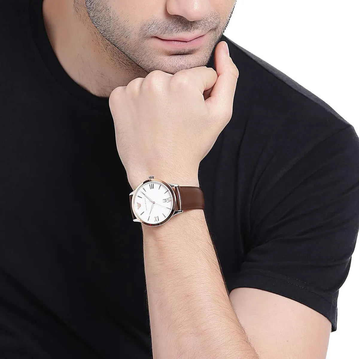 Emporio Armani Giovanni watch worn on wrist with white dial and brown leather strap
