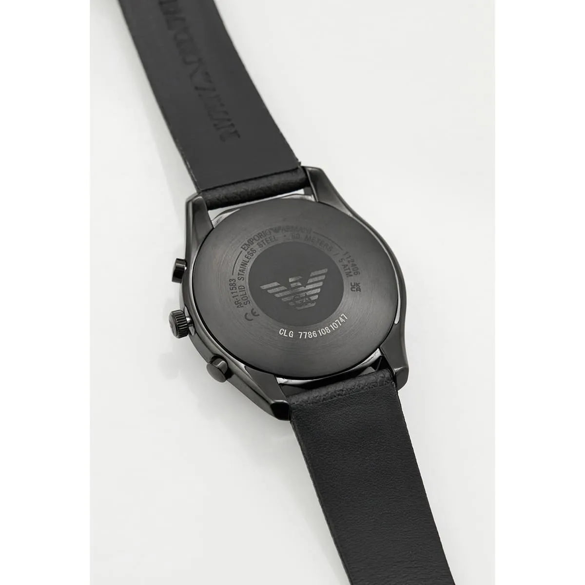 Emporio Armani AR11583 watch caseback detail with eagle logo and leather strap