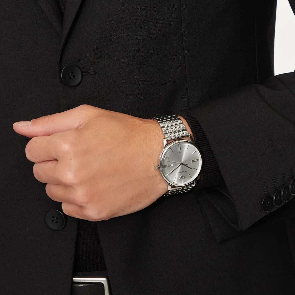 AR11599 Emporio Armani watch worn on wrist with business suit