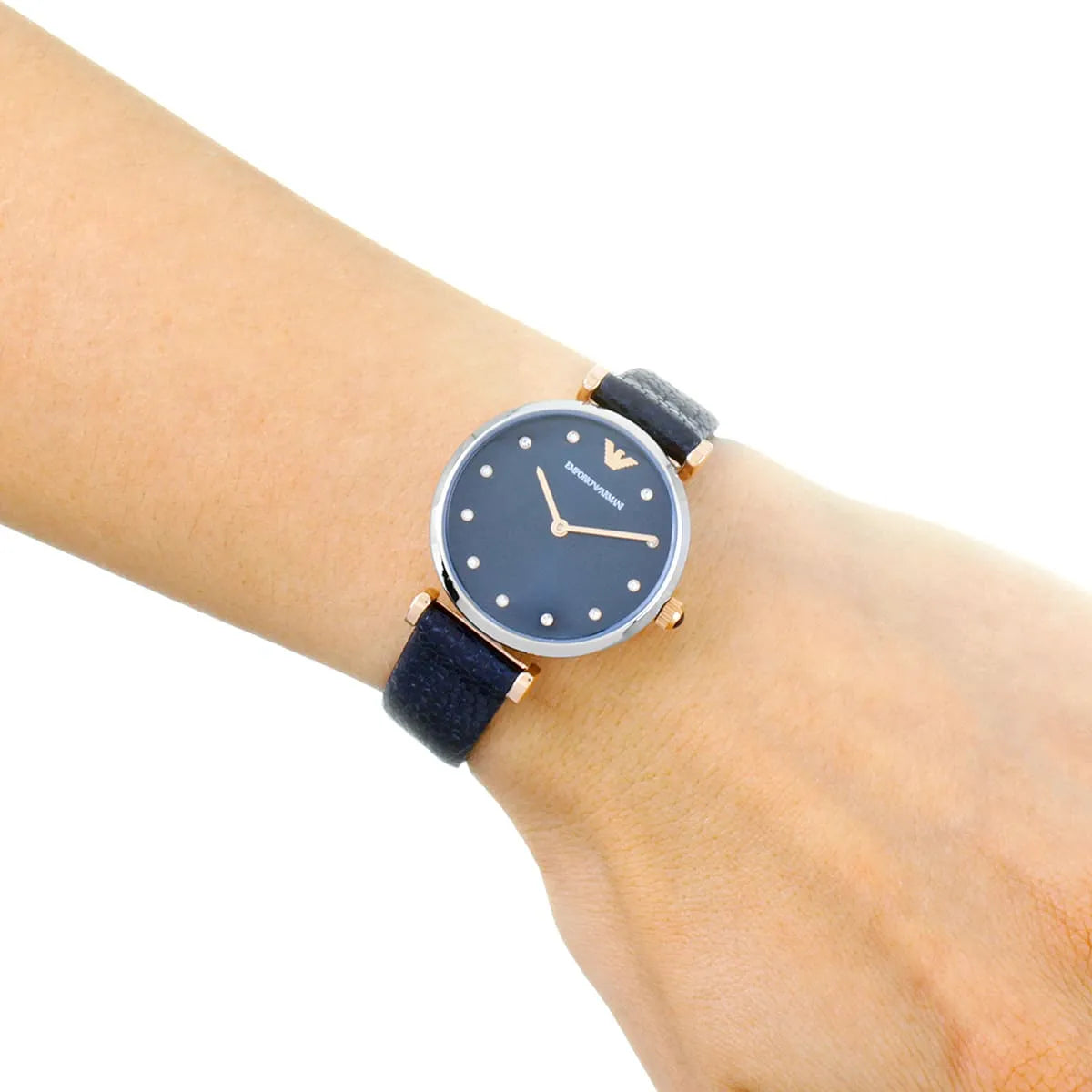Emporio Armani AR1989 women's watch worn on wrist with dark leather strap