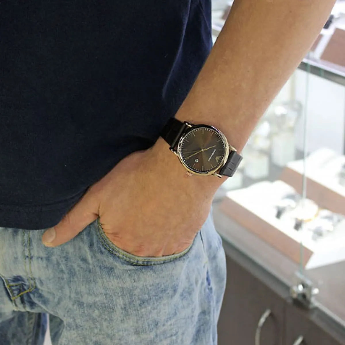 Emporio Armani Luigi AR2503 worn on wrist with brown dial and leather strap