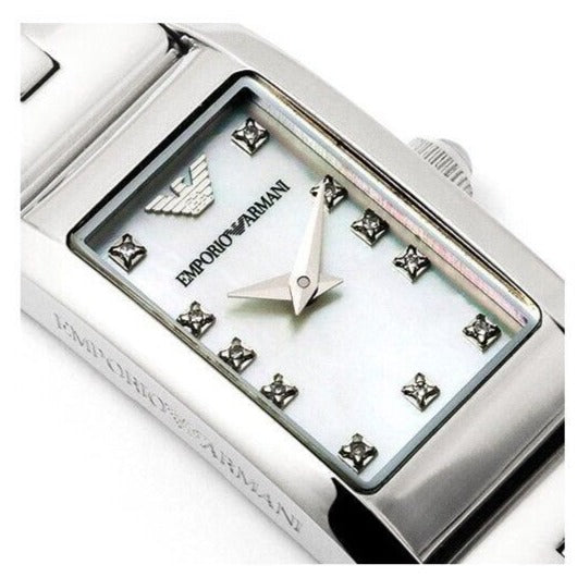 Close-up of mother-of-pearl dial with diamond hour markers and Emporio Armani branding