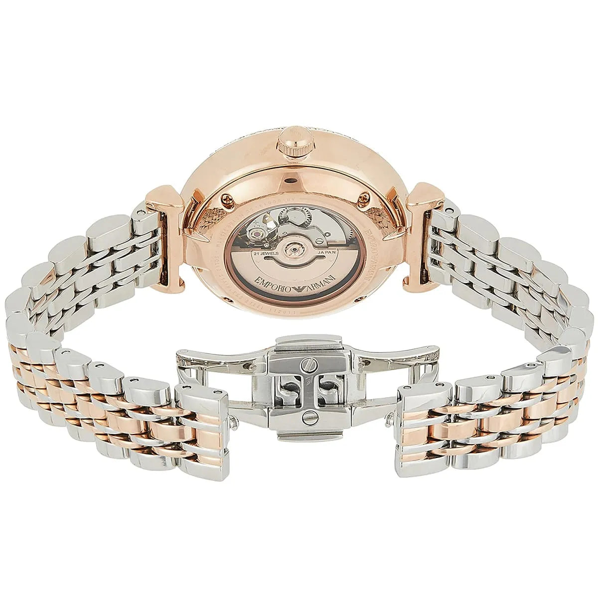Flat lay showing caseback with automatic movement, strap, and clasp detail