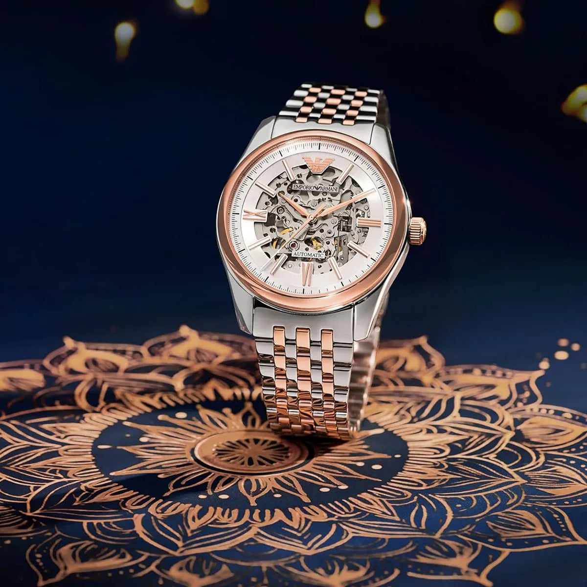 Emporio Armani AR60092 watch on decorative surface with bokeh background