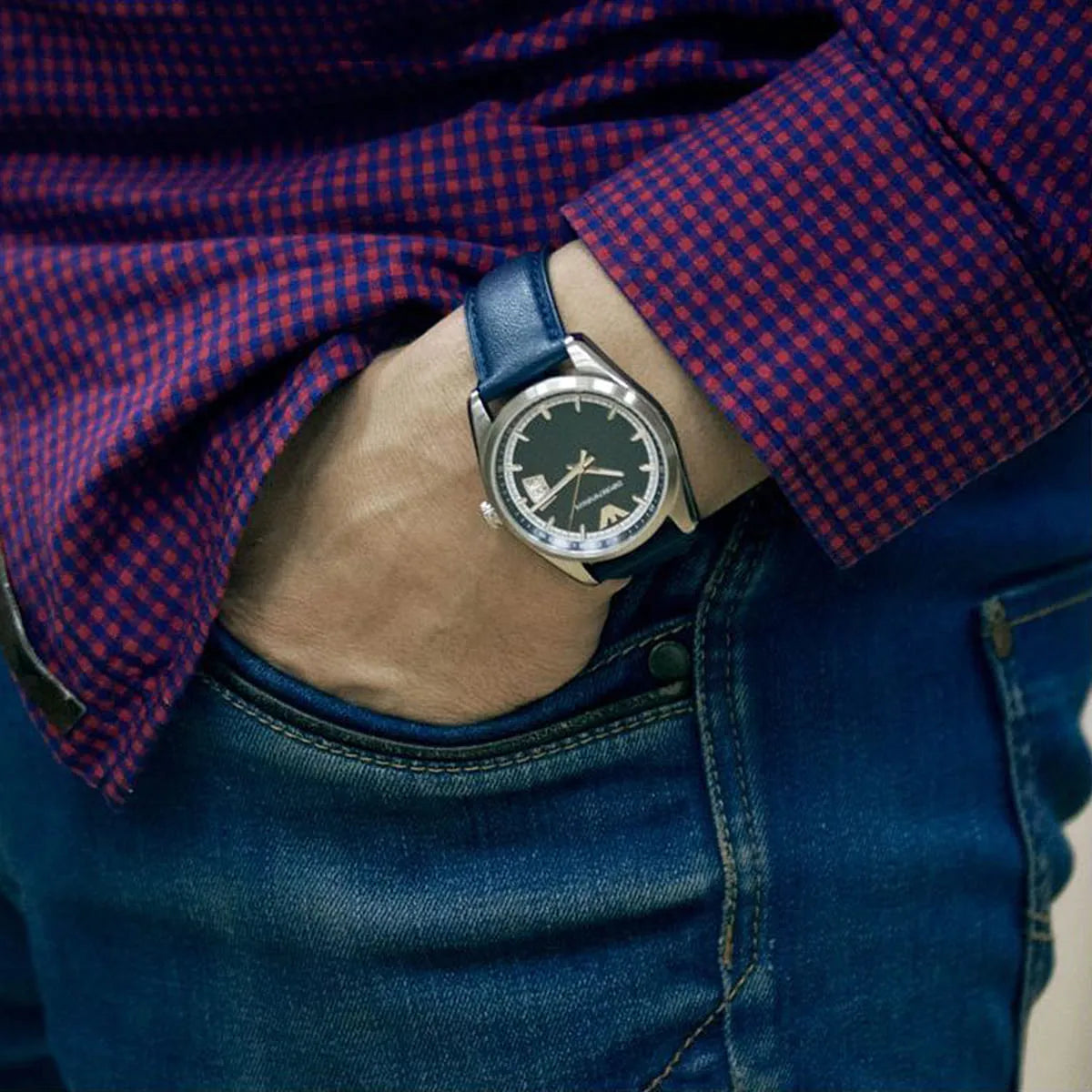 AR6017 New Tazio watch worn on wrist with blue dial and navy leather strap