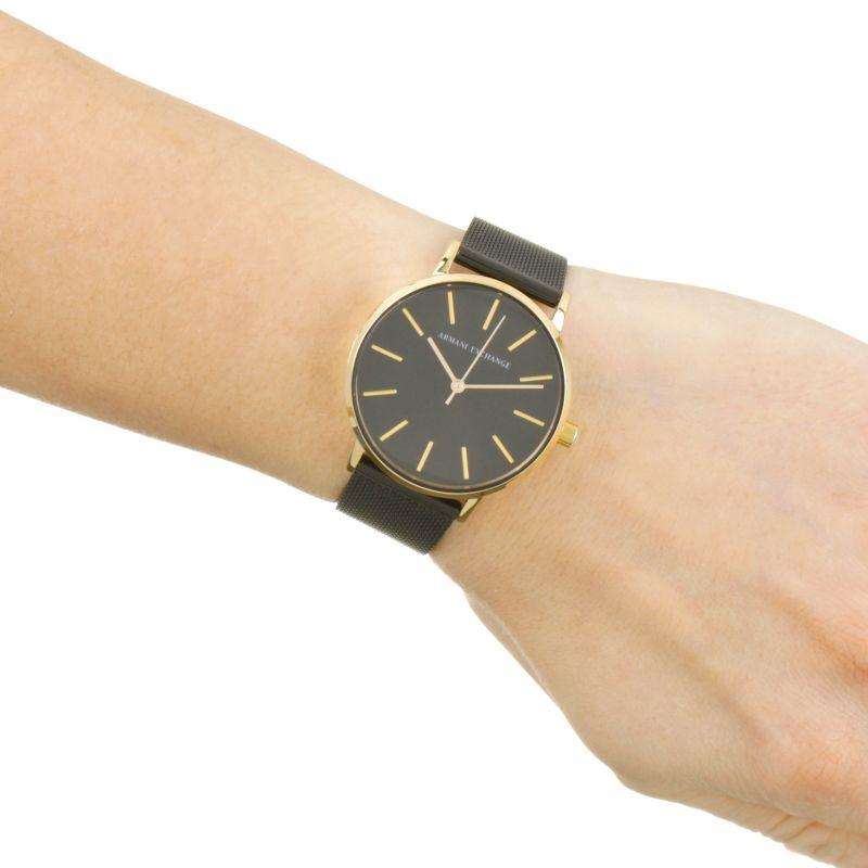 Armani Exchange AX5548 women's watch with black mesh strap worn on wrist