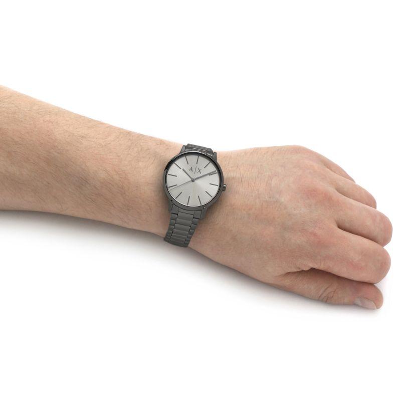 Armani Exchange Cayde AX2722 watch on wrist with grey dial and steel bracelet