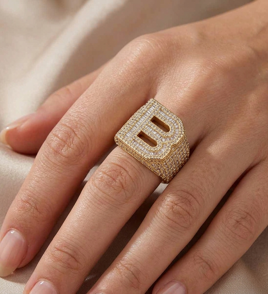 Big Daddy Bless Up baguette diamond ring worn on finger showing signet style face
