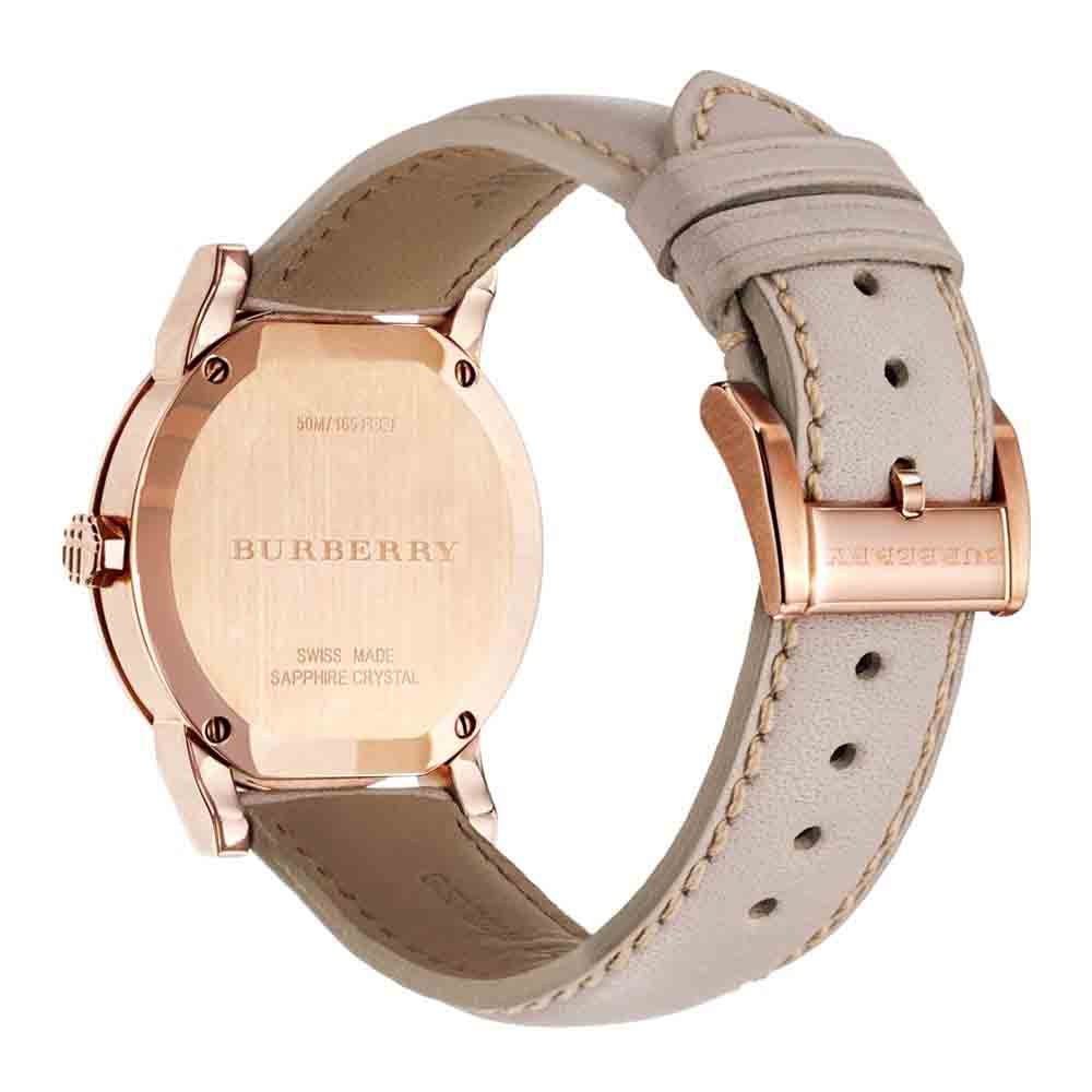 Burberry BU9109 case back showing rose gold tone metal and leather strap with buckle