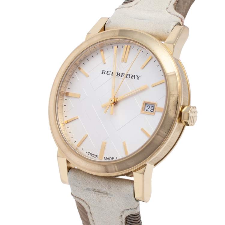 Burberry The City watch angled view with white leather band and gold-tone case