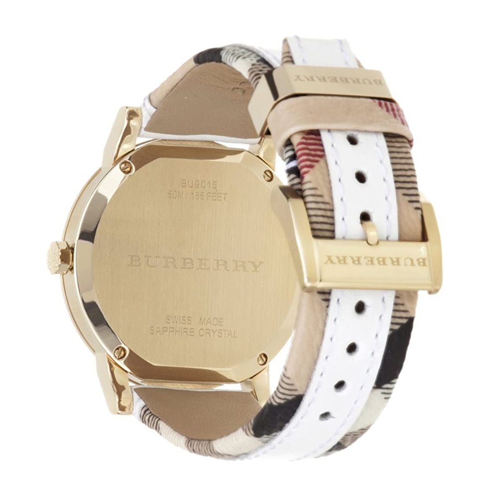 Burberry The City caseback showing engraving and sapphire crystal, with white leather strap detail