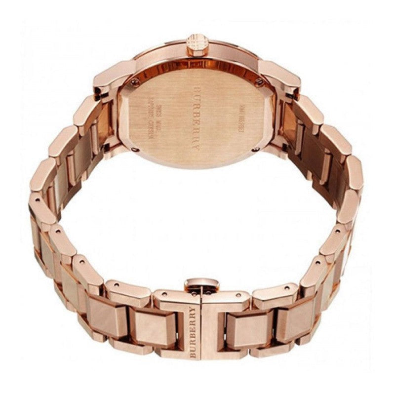 Burberry The City Petite caseback showing rose gold stainless steel case back with engraving
