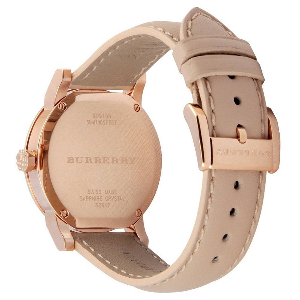 Burberry The City watch caseback showing rose gold case back with Burberry branding and Swiss made marking