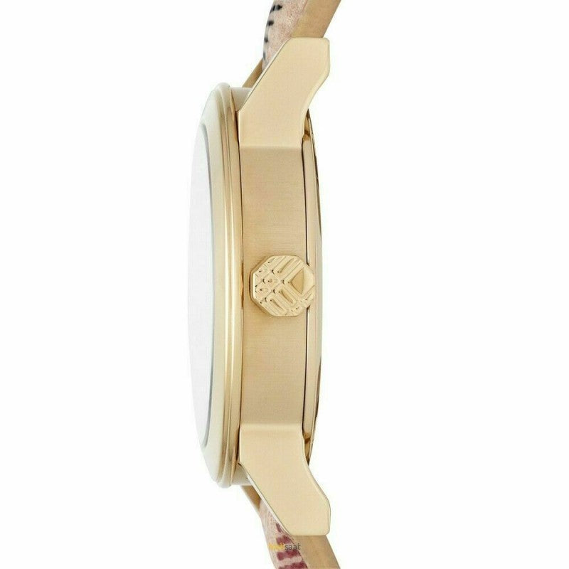 Side profile of Burberry The City watch showing gold-tone case and beige patterned leather band