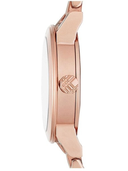 Side view of Burberry The City rose gold watch showing case profile and strap