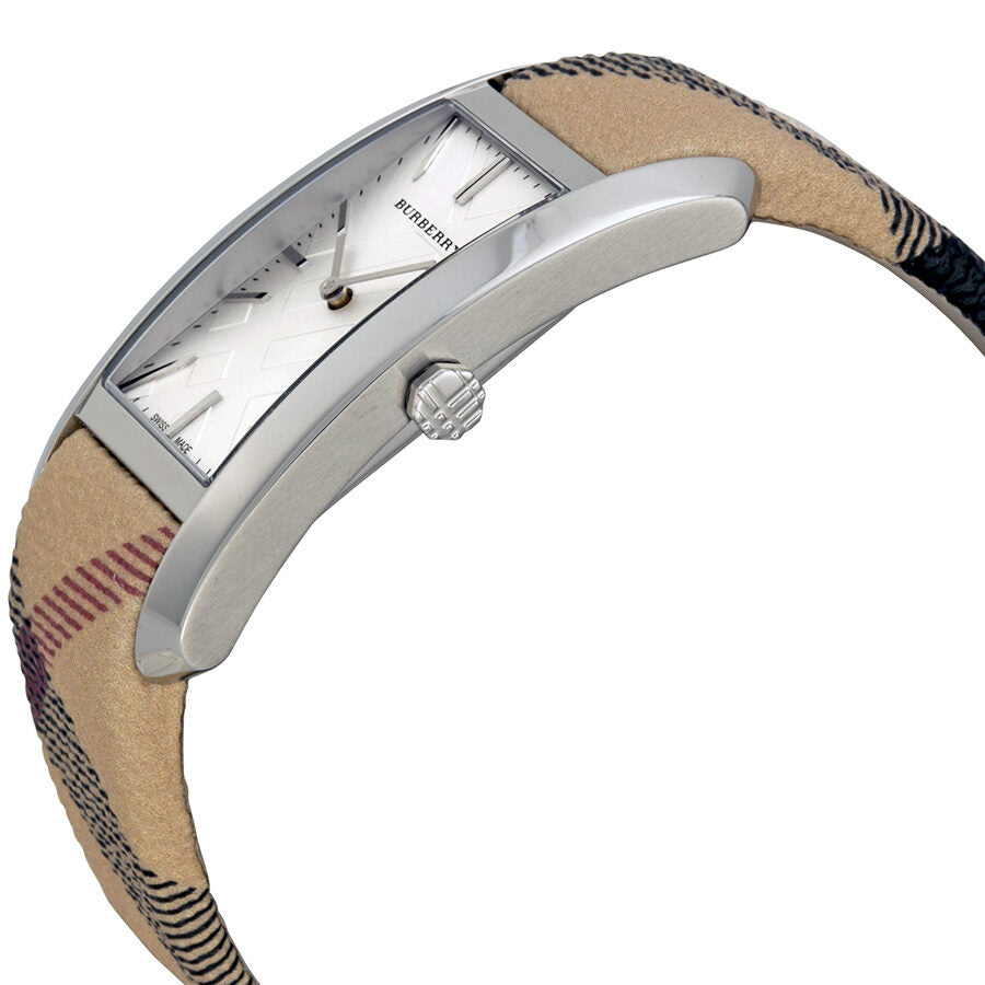 Side angle view of The Pioneer watch showing stainless steel case and Haymarket check canvas strap