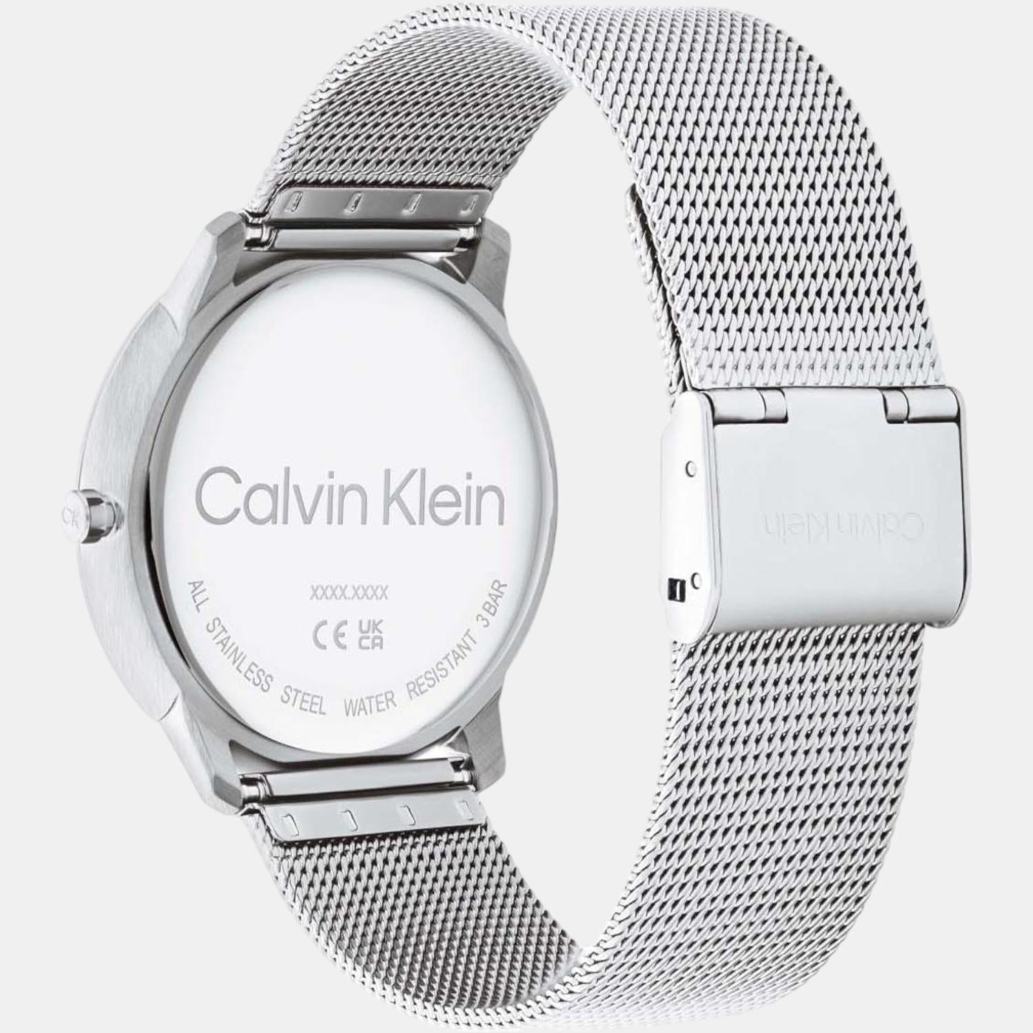 Calvin Klein watch caseback showing stainless steel and mesh bracelet detail