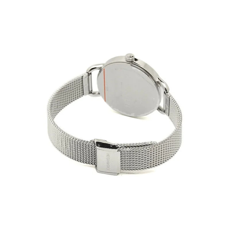 Calvin Klein Even white dial ladies watch worn on wrist with mesh bracelet