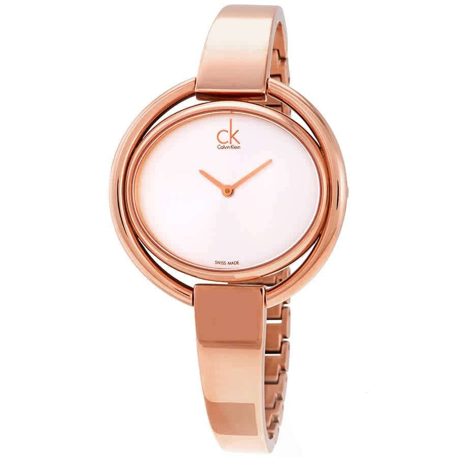 Calvin Klein Impetuous ladies watch from angled view showing rose gold bangle bracelet