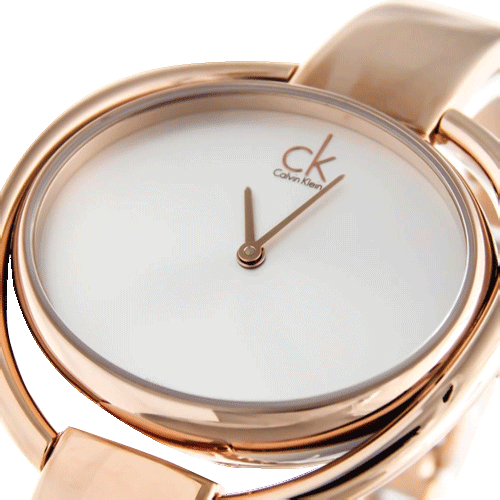 Calvin Klein Impetuous dial close-up showing minimalist silver face and rose gold accents