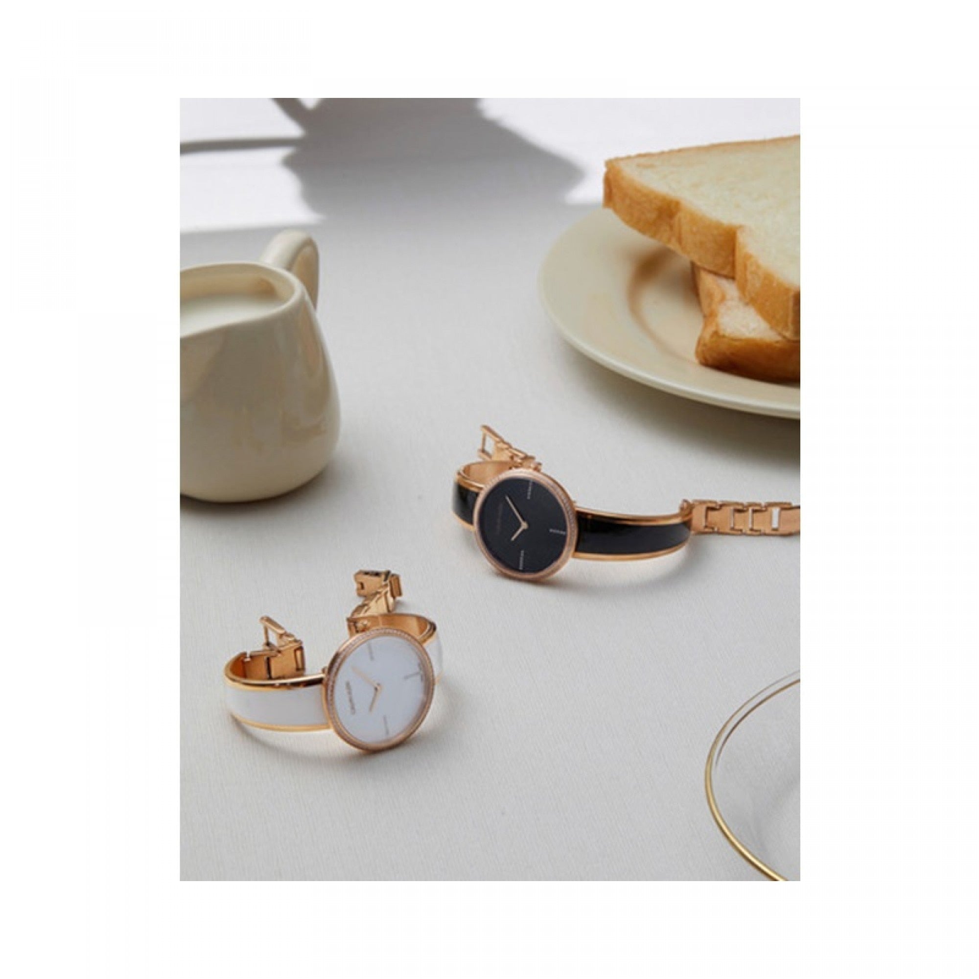 Calvin Klein Seduce watches displayed on white surface with lifestyle elements