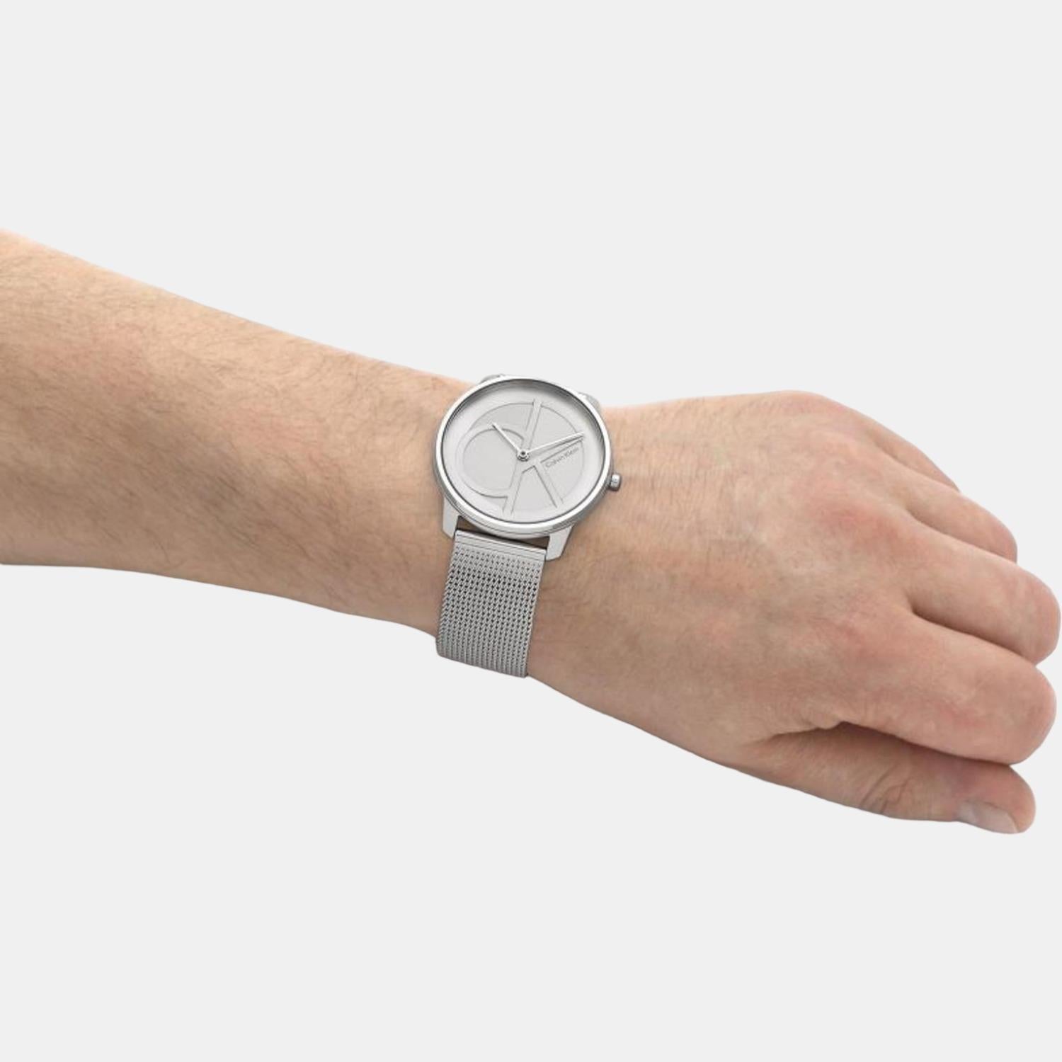 Calvin Klein Stately watch worn on wrist with silver mesh strap